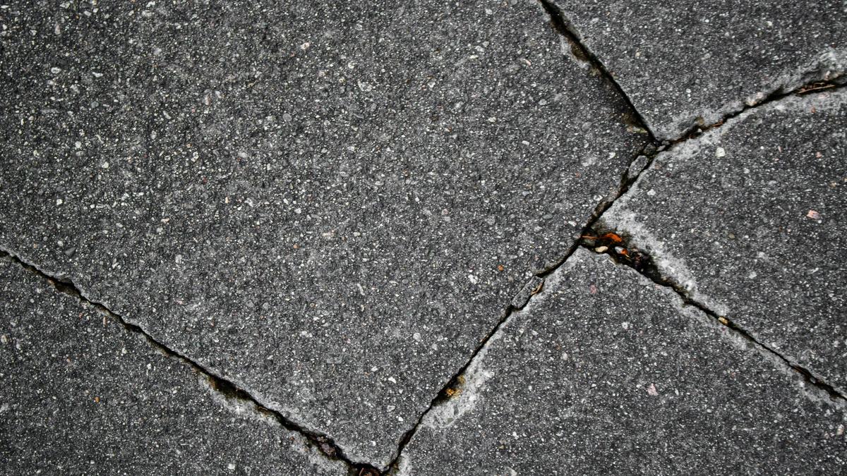 Cracked concrete slab with separated joints that need repair or replacement