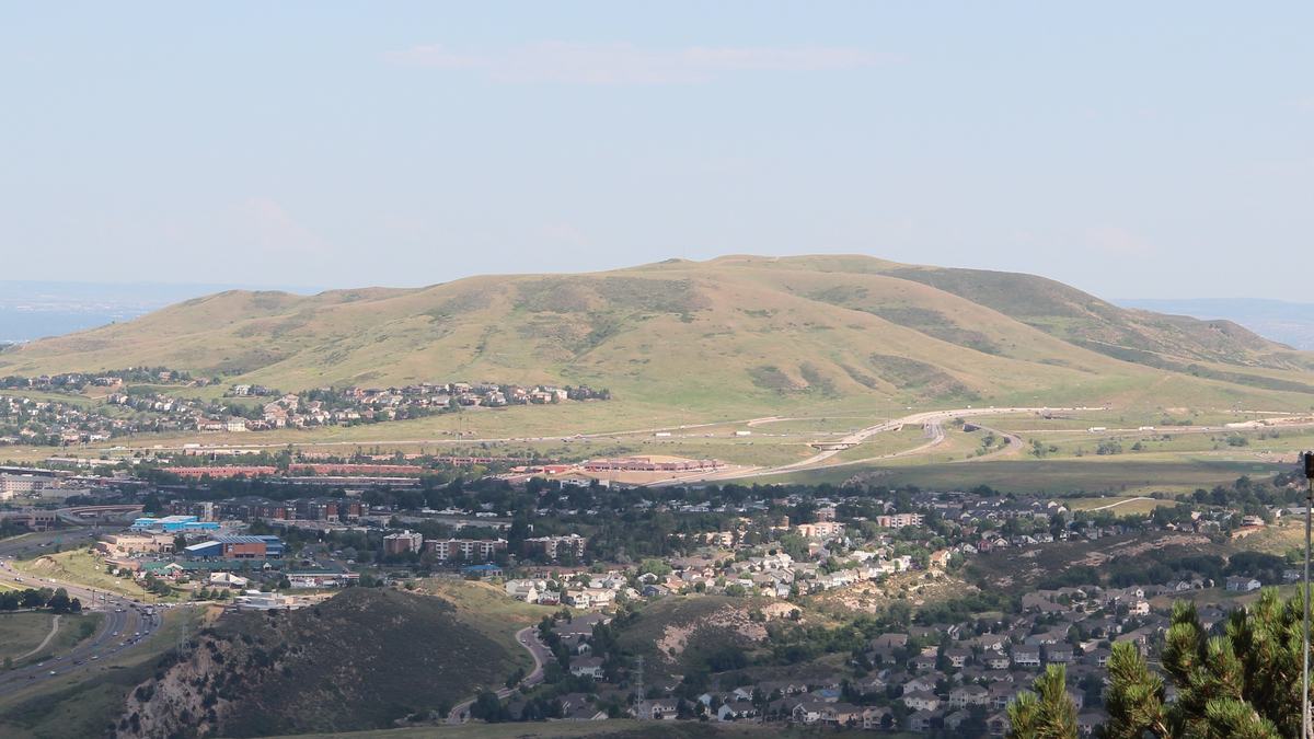 Green Mountain rising above Lakewood, Colorado neighborhoods and highways